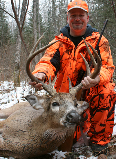 Dr Ken Nordberg's son Ken with a trophy-class 8-pointer from 2012