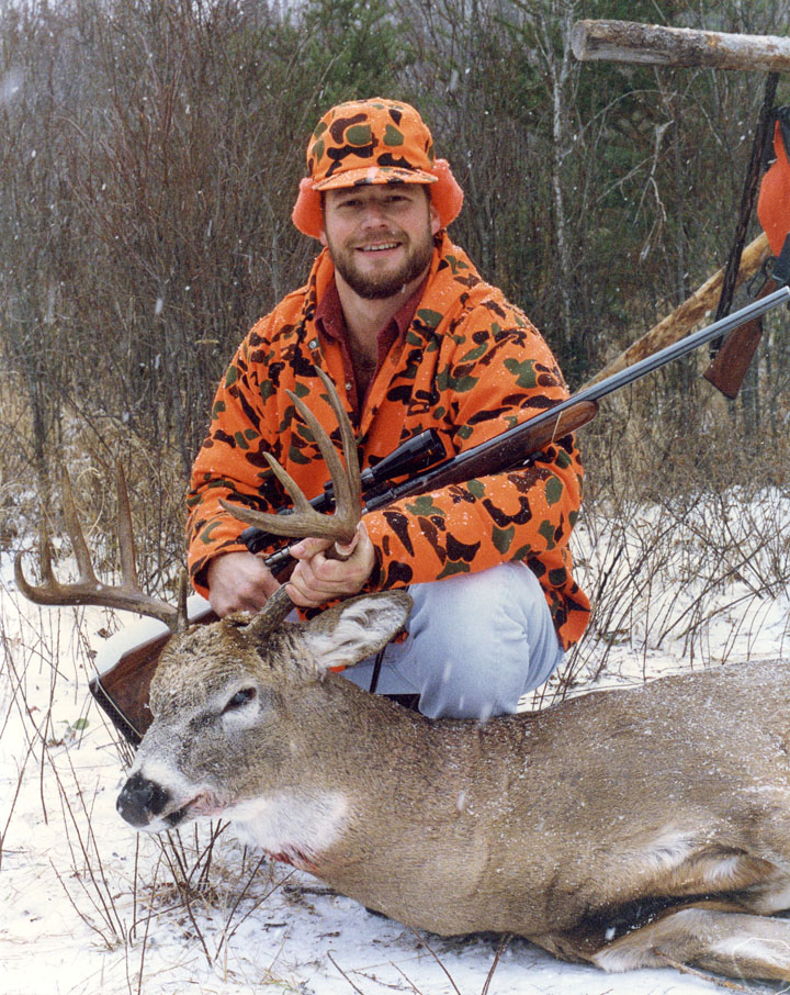 Doc's son Ken with his monster buck.