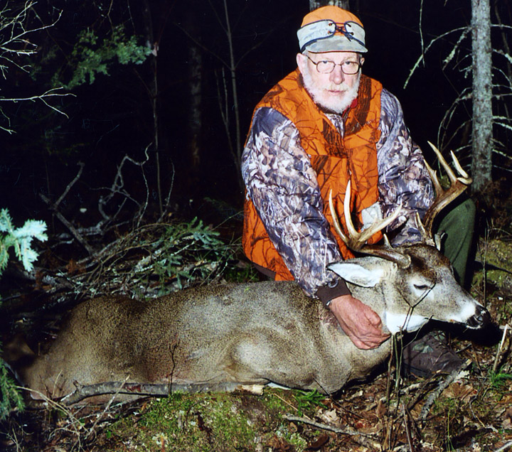 Doc's hunting partner Silver Harychi with a nice, trophy-class buck. (2004, 10-pointer)
