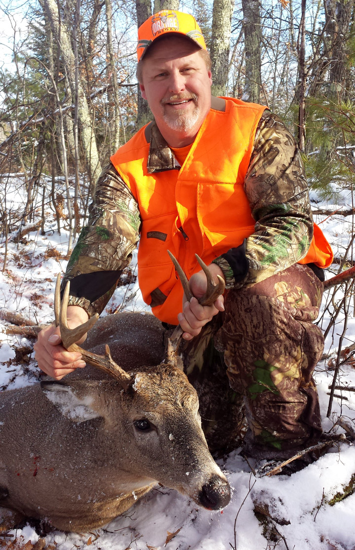 David Nordberg with his 1st buck of the season. (2014, 8-pointer)