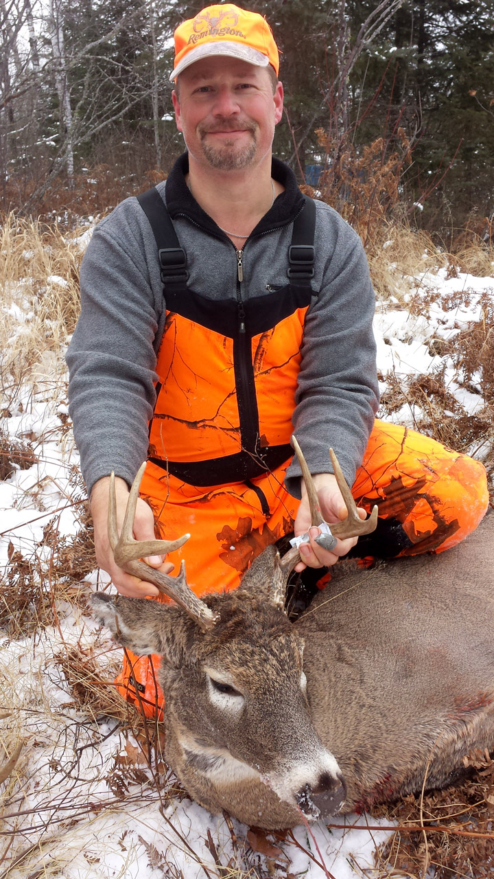Doc's son Ken with his latest buck. (2014, 8-pointer)